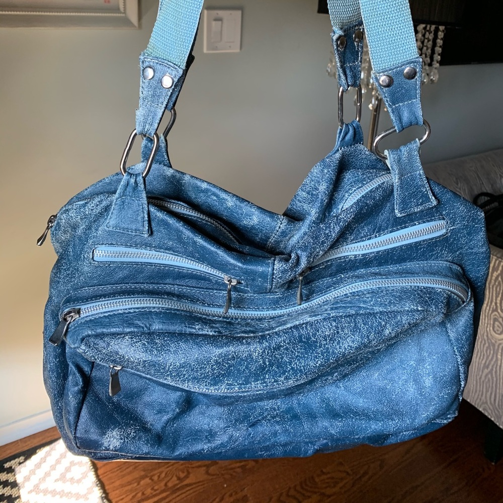 Distressed look bag; Moroccan leather; artisan